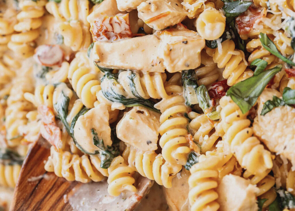 Fusilli pasta with chicken breast.